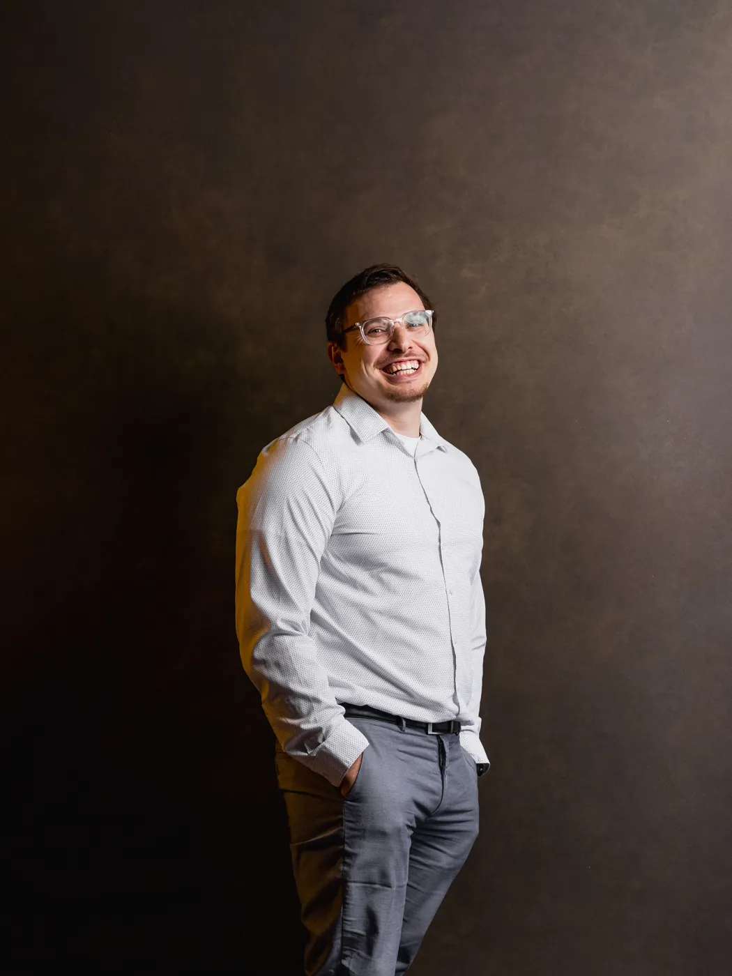 Studio portrait, standing, laughing